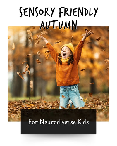 a child throwing dried leaves into the air during an autumn day
