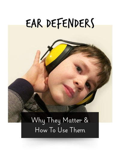 a child wearing ear defenders