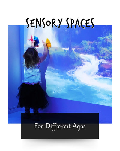 a little girl wearing a tutu in sensory room looking up at a projector with colorful lights