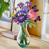 LEGO Olivia Rodrigo's Flower Bouquet displayed in a glass vase on a wooden desk
