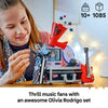 A girl playing with the LEGO Olivia Rodrigo's Secret Storage set, a 1,085-piece build for ages 10 and over
