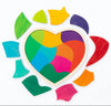 A colorful heart-shaped wooden craft or puzzle board with painted segments in green, blue, yellow, orange, pink, purple, and red, surrounded by matching painted wood pieces on a white background.
