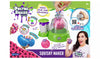 Doctor Squishy Squishy Maker toy kit packaging featuring a green and purple squishy maker machine, colourful demonstration graphics, and a smiling woman holding a pink squishy on the front.