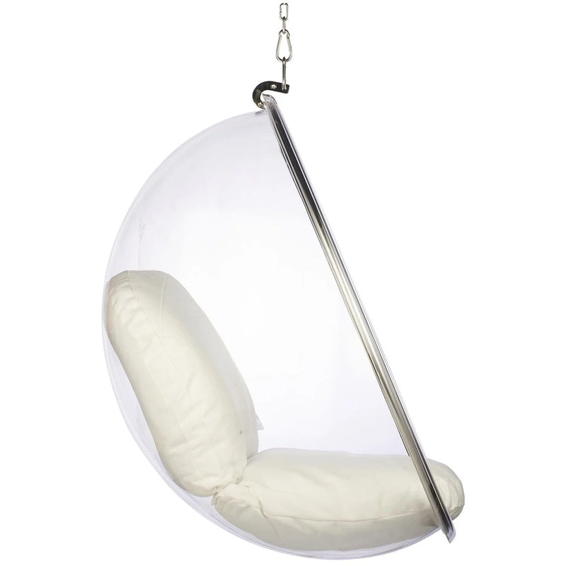 A modern clear hanging egg chair with cream-colored cushions and a chrome metal frame, suspended by a chain against a plain white background.