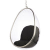 Clear hanging egg chair with a black cushioned seat and backrest, suspended by a silver metal frame and chain against a white background.