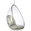 A clear hanging egg chair with a metallic silver frame and light gray cushioned seat and backrest, suspended by a chain against a white background.