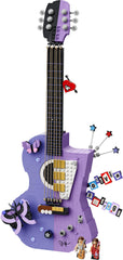 LEGO Editions Olivia Rodrigo's Dual Guitar 43031 built model combining electric and acoustic guitar designs in purple, with two Olivia Rodrigo minifigures
