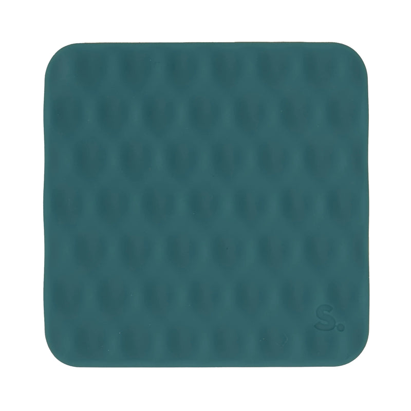 Close-up of the green mesh-textured surface of a Speks Slabs silicone sensory sticker
