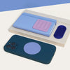 Speks Slabs sensory stickers on a notebook and phone case, showing the square, oval and circle shapes
