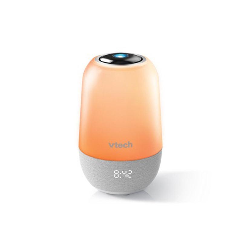 VTech V-Hush Lite sleep trainer glowing orange with a digital clock display.
