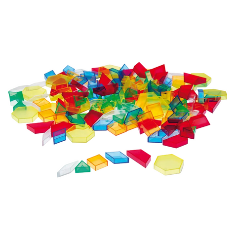 Colorful transparent geometric building blocks scattered on a white background